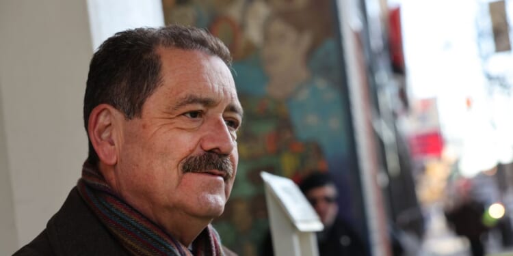 Rep. Jesus "Chuy" Garcia greets commuters during an early morning campaign stop in the Pilsen neighborhood on Feb. 21, 2023, in Chicago, Illinois.