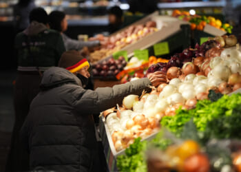 Customers shop at the Reading Terminal Market in Philadelphia on Oct. 29, 2025.