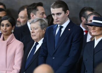 Barron Trump and Melania Trump look on during the inauguration ceremony in the US Capitol Rotunda in Washington, DC on Jan. 20, 2025.