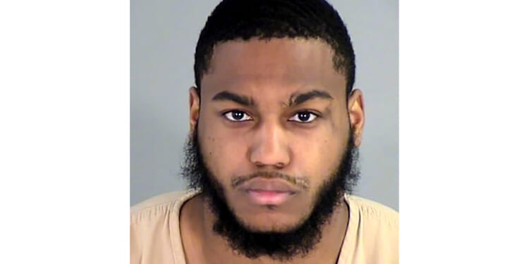 This booking photo released by the Henrico County Sheriff's Office shows Christopher Darnell Jones Jr., who was arrested on Nov. 14, 2022, in the fatal shooting of three football players at the University of Virginia.