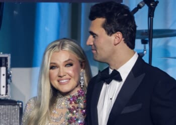 Charlie Kirk, right, is seen with his wife Erika Kirk on stage during the Turning Point USA Inaugural-Eve Ball in Washington, D.C., on Jan. 19.
