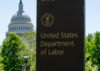 In this May 7, 2020, file photo, the entrance to the Labor Department is seen near the Capitol in Washington.