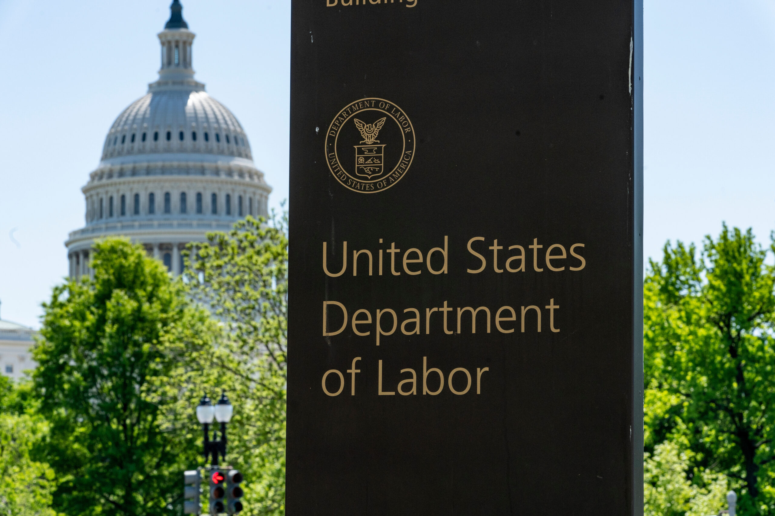In this May 7, 2020, file photo, the entrance to the Labor Department is seen near the Capitol in Washington.