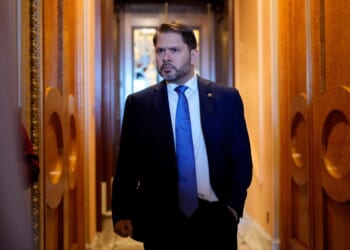 Sen. Ruben Gallego walks out of the Senate Chamber of the US Capitol Building on Oct. 1, 2025.