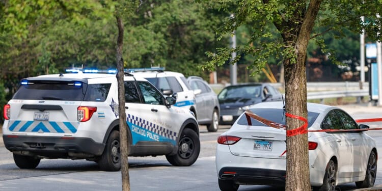 A car involved in a shooting sits outside Chicago Police Departments Morgan Park District station on July 7, 2021, in Chicago, Illinois.