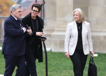 U.S. Army Gen. (Ret.) Mark Milley, political commentator Rachel Maddow, and Milley's wife Hollyanne Milley arrive for the funeral service for former Vice President Dick Cheney at the National Cathedral on Nov. 20, 2025, in Washington, D.C.