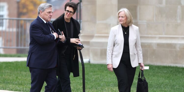 U.S. Army Gen. (Ret.) Mark Milley, political commentator Rachel Maddow, and Milley's wife Hollyanne Milley arrive for the funeral service for former Vice President Dick Cheney at the National Cathedral on Nov. 20, 2025, in Washington, D.C.