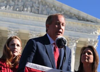 Texas Attorney General Ken Paxton speaks outside the US Supreme Court in Washington, DC on Nov. 1, 2021.
