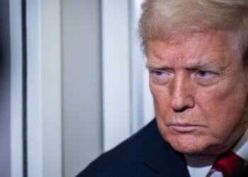 President Donald Trump speaks to reporters aboard Air Force One as it heads for Florida during his trip to Mar-a-Lago in Palm Beach, Florida, on Nov. 25, 2025.