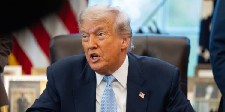 President Donald Trump is pictured during a meeting with the White House Task Force on the FIFA World Cup 2026 in the Oval Office at the White House in Washington, D.C., on Nov. 17, 2025.