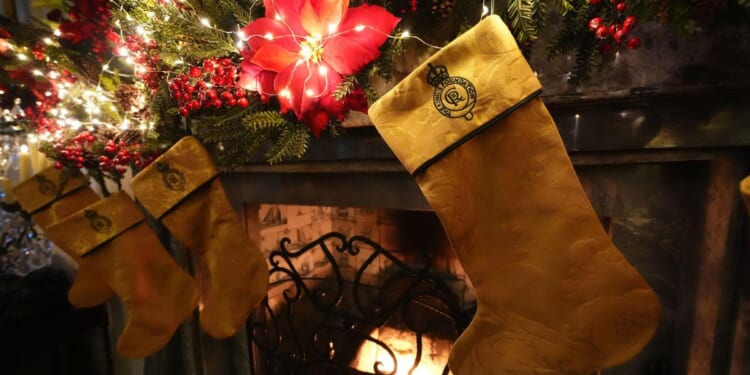 A very royal Christmas. King Charles III's charity auctions stockings made from monarch's drapes