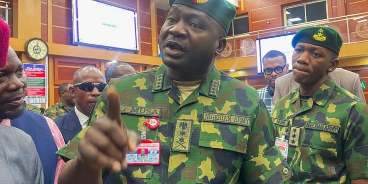 Nigerian president nominates ex-military chief for defense minister after he was forced out