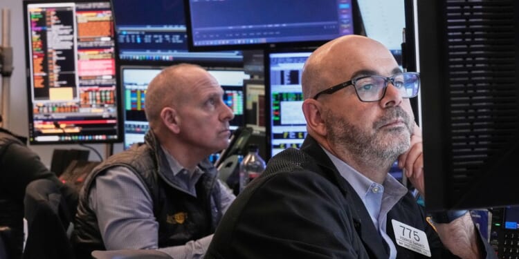 Wall Street hanging near its all-time high as calm continues to hold