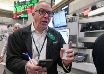 Wall Street flirts with all-time high