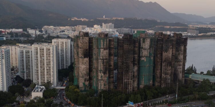 Hong Kong man arrested for posts about deadly high-rise fire, criticizing authority