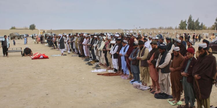 Officials: Overnight exchange of fire along the Afghan-Pakistan border kills 5 and wounds 8