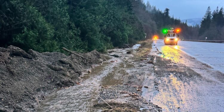 Storm systems bring wintry mix to the Upper Midwest, heavy rain to the Pacific Northwest