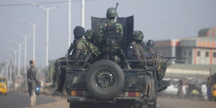 Witnesses: Nigerian soldiers opened fire on protesters in the northeast, killing 9