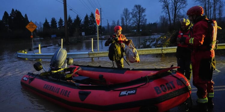Pacific Northwest braces for more rain after a powerful storm caused flooding and rescues