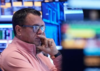 Wall Street is quiet as it awaits the Federal Reserve's announcement in the afternoon