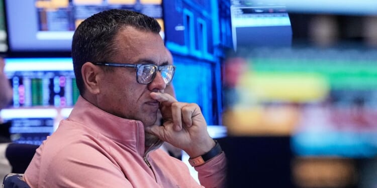 Wall Street is quiet as it awaits the Federal Reserve's announcement in the afternoon