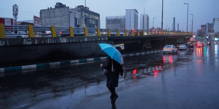 First rain of autumn falls in Iran's capital, but the drought-ravaged country needs far more