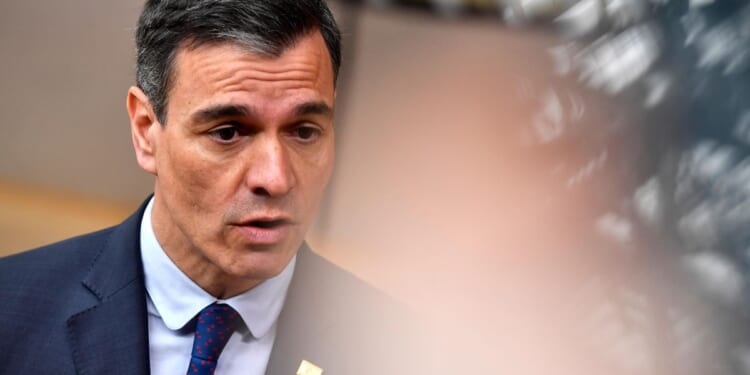 Spain's leader finds himself alone in defending immigration as other EU heads take a tougher line