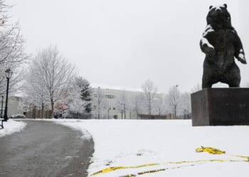 Manhunt resumes after Rhode Island police release person of interest in Brown University shooting