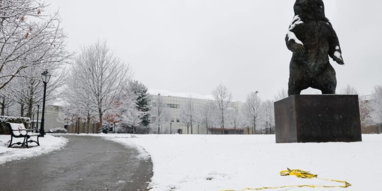 Manhunt resumes after Rhode Island police release person of interest in Brown University shooting