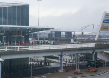 Customs officer at JFK airport fires his gun during a freeway fight