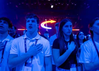 Conservatives clash at Turning Point USA conference over direction of MAGA movement