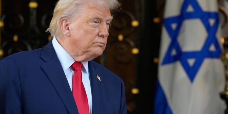 Trump threatens to 'immediately' strike Iran again if it rebuilds missile, nuclear programs