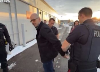 Canadian police arrest Pastor Derek Reimer for refusing to write a letter of apology to a librarian for disrupting a drag-queen story hour event.