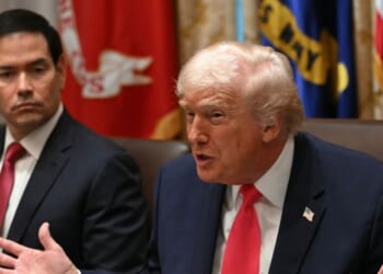 President Donald Trump speaks next to Secretary of State Marco Rubio during a meeting in the Cabinet Room of the White House on Dec. 2, 2025.