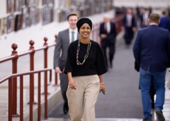 Rep. Ilhan Omar walks towards the U.S. Capitol Building on Dec. 10, 2025, in Washington, D.C.