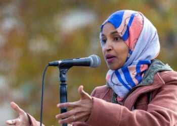 Rep. Ilhan Omar speaks to a group of supporters at University of Minnesota in Minneapolis, Minnesota, on Nov. 2, 2018.