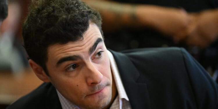 Luigi Mangione appears in a Manhattan Criminal Court for a hearing related to his murder case on Dec. 2, 2025 in New York.