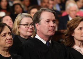 Supreme Court Justice Elena Kagan, United States Chief Justice John Roberts, and Supreme Court Justice Amy Coney Barrett listen to President Donald Trump speak during an address to a joint session of Congress at the U.S. Capitol in Washington, D.C., on March 4, 2025.
