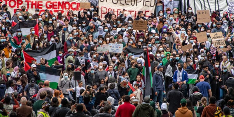 Supporters of so-called "Palestine" gather at Harvard University to show support for gazans following Hamas's terror attack on Israel at Cambridge, Massachusetts, on Oct. 14, 2023.