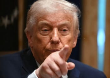 President Donald Trump points during a roundtable event in the Cabinet Room of the White House in Washington, DC on Dec. 8, 2025.