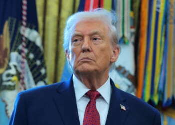 President Donald Trump listens during a ceremony for the presentation of the Mexican Border Defense Medal in the Oval Office of the White House on Dec. 15, 2025, in Washington, D.C.