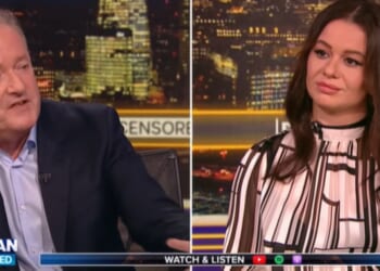 Piers Morgan interviewed Elizabeth Kinney, who was arrested in the United Kingdom while in the bath for allegedly sending a mean text message.