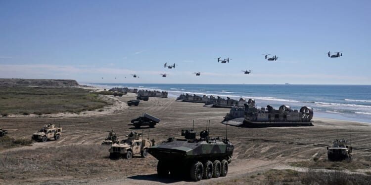 Marines perform an amphibious capabilities demonstration as Vice President J.D. Vance and Second Lady Usha Vance visit, on Red Beach at Camp Pendleton, California, on Oct. 18, 2025, as part of the Marine Corps' 250th anniversary celebrations.