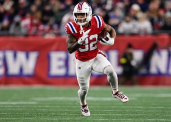 TreVeyon Henderson #32 of the New England Patriots runs with the ball Monday during the second quarter against the New York Giants at Gillette Stadium in Foxborough, Massachusetts.
