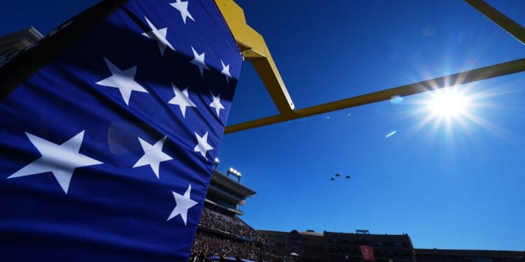 Winds cause snafu for parachute team dropping into Armed Forces Bowl in Texas