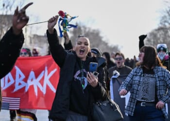 Fatal shooting in Minneapolis of woman by ICE officer leaves city on edge