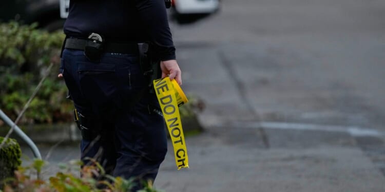Authorities say federal immigration officers shoot and wound 2 people in Portland, Oregon