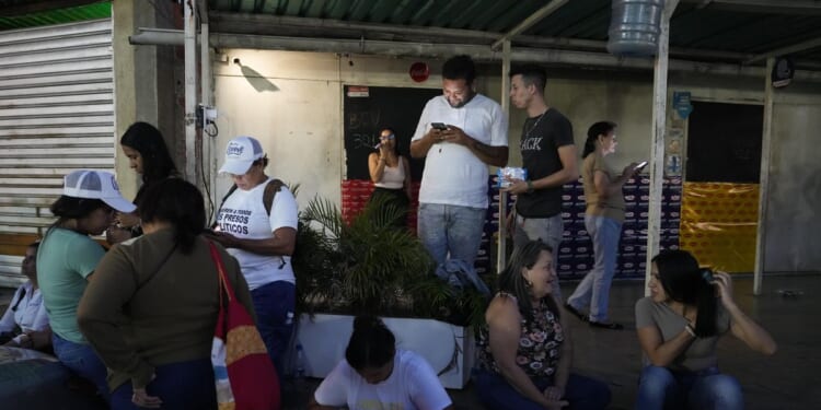 Donald Trump says he canceled additional attacks on Venezuela, pointing to prisoner release