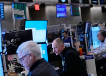 Stocks of credit card companies slumping as Wall Street overall drifts in mixed trading