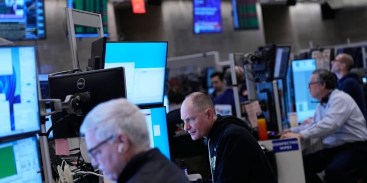 Stocks of credit card companies slumping as Wall Street overall drifts in mixed trading